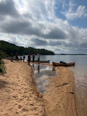 Exploring a Basswood Lake beach to camp across from Canada. 