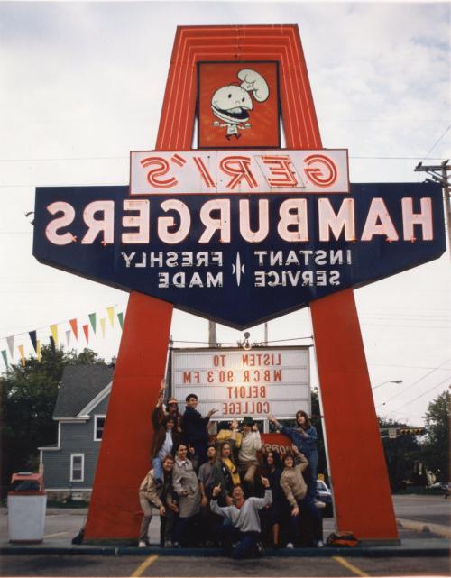 The instantly recognizable red, white, and blue Geri's Hamburgers sign gave a plug to WBCR FM rad...