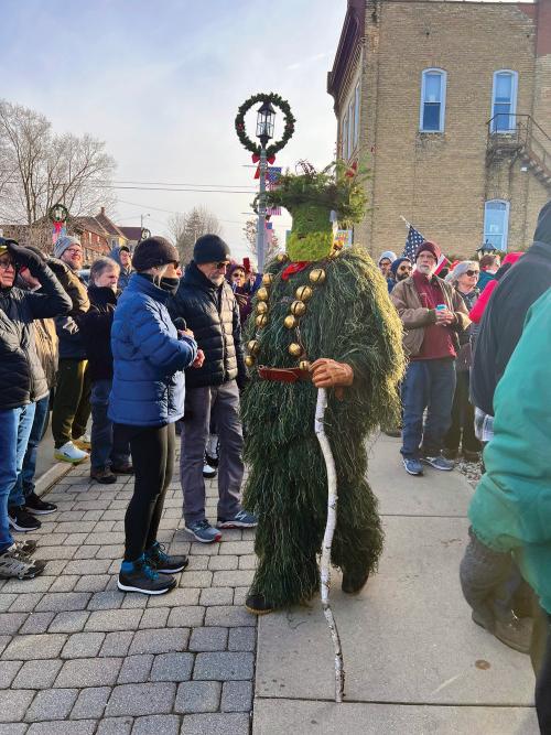 Chlaüse join the crowds to walk the streets of New Glarus.